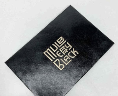 Raised gold ink foil stamp black paper envelope