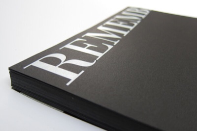 White ink black paper cardstock folder