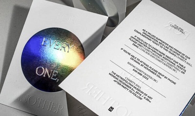 Letterpress iridescent foil event invitations