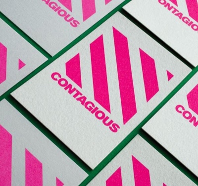 Neon pink offset business cards