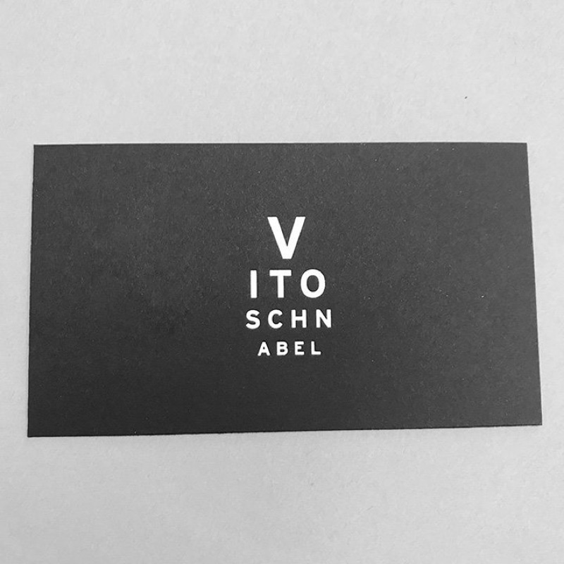 Black business cards with foil and white ink