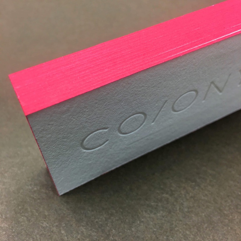 Hot pink fluorescent edge painted business card