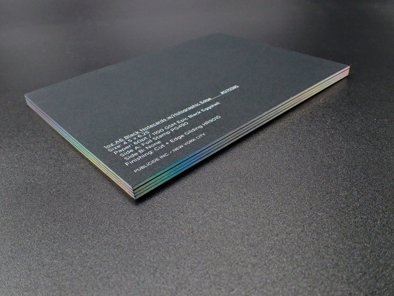White foil stamped black paper packaging